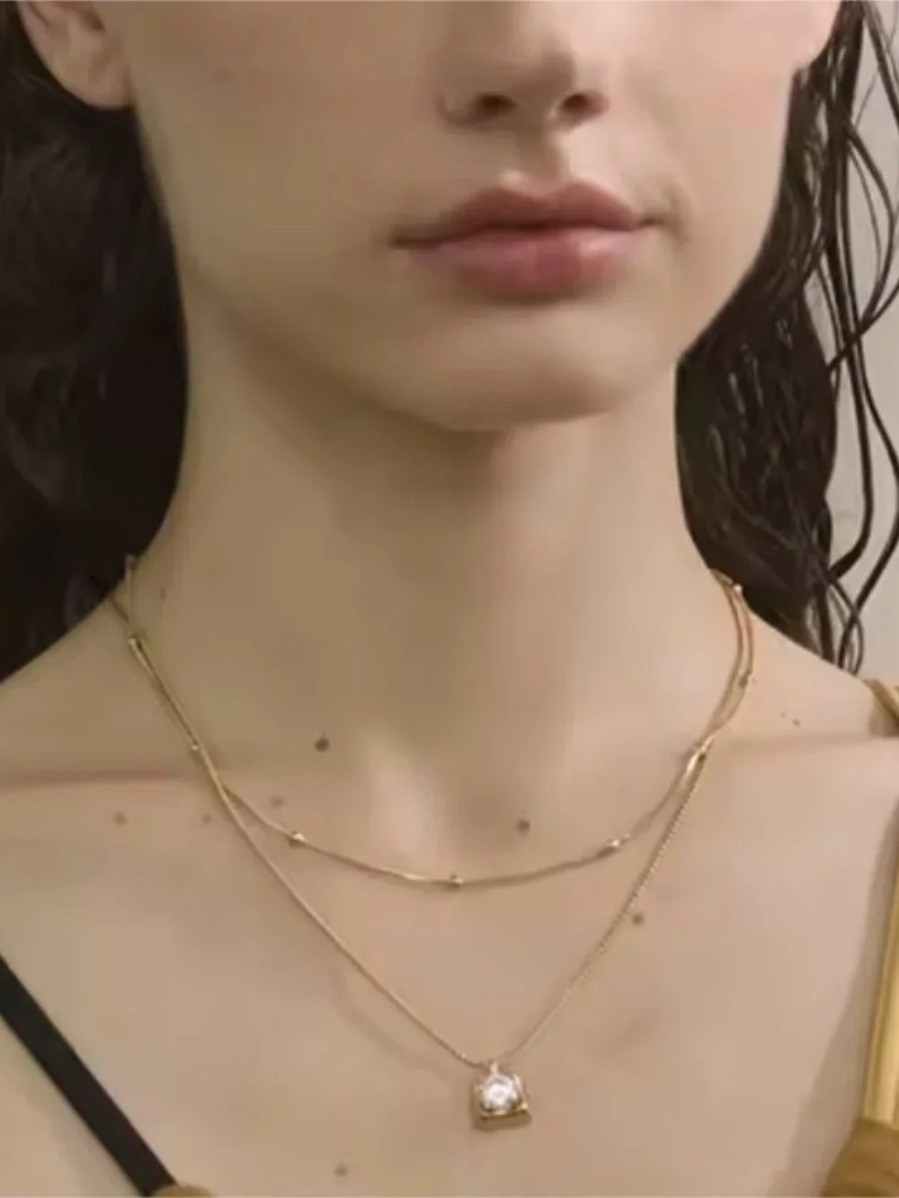 Gold Toned Pendant Necklace with Clear Stone